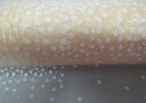 Organza Glitter Ivory With Daisy, Approximately 48cm Wide (480mm) (ORGIVD)